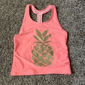 This is a two piece bathing suit but the top covers your stomach.